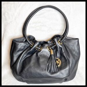 Michael Kors Black Leather Hobo W/tassel & Logo.
